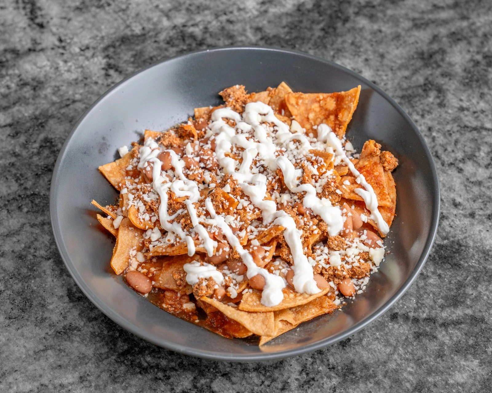 Authentic Mexican chilaquiles — a signature breakfast at El Cafesito By Mexicanada, Old Strathcona Edmonton